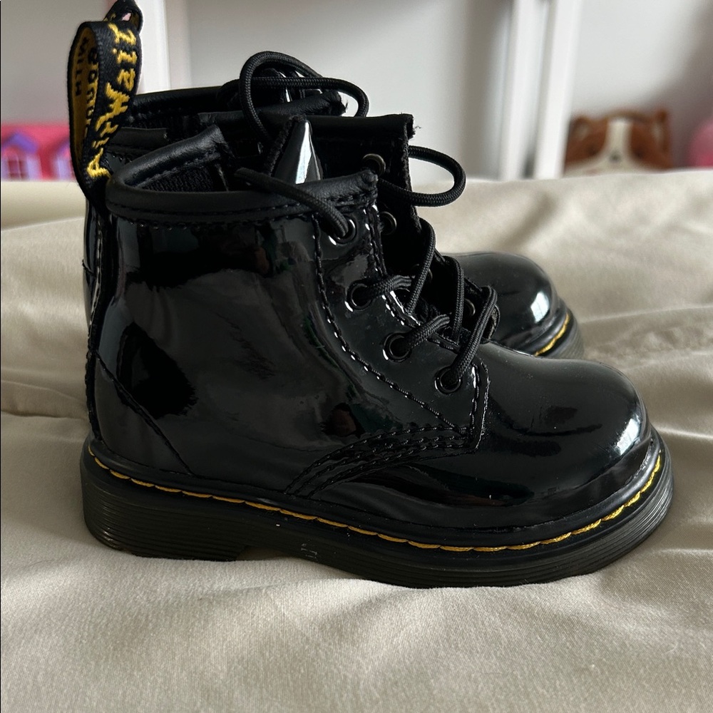 Dr. Martens Shiny Black Boots with Yellow Accents
